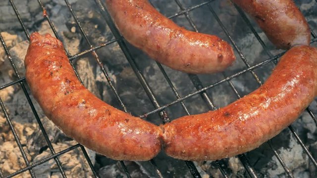 Grilled sausages on bbq. Variety Original Nuremberg Rostbratwurst . Pork ground meat, dill, nutmeg, garlic, cardamom, marjoram in the natural gut. There are also other types: rostbratwurst, currywurst