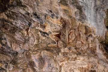 Ancient carved in the wall of the cave.