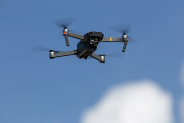 The drone copter flying with digital camera