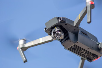 The drone copter flying with digital camera