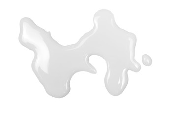 Spilled milk puddle isolated on white background and texture, top view