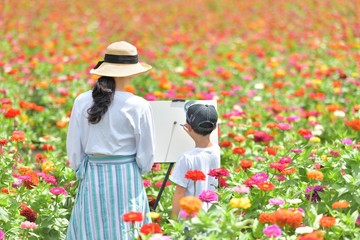 夏の花園・キャンバスで遊ぶファミリー