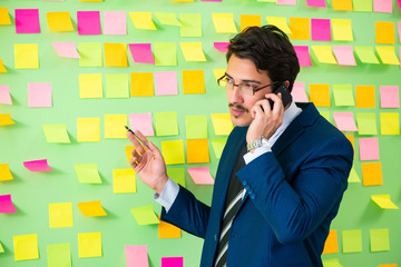 Businessman with many business priorities