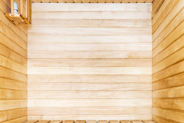 Wooden interior of the sauna from the lime strips