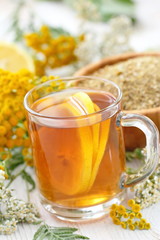 Herbal tea. Detox drink with wild herbs and lemon