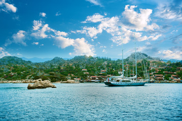 Fototapeta na wymiar Beautiful scenery with sea and mountains, tourist boat. Fjord in Mediterranean Sea. 