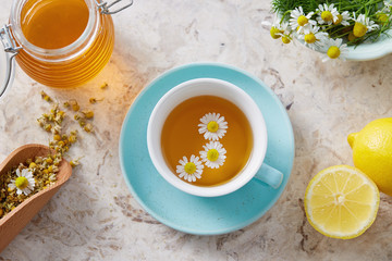 Chamomile flowers and chamomile tea