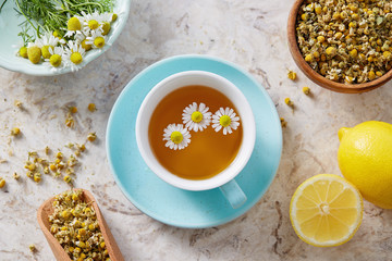 Chamomile flowers and chamomile tea