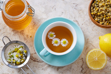 Chamomile flowers and chamomile tea