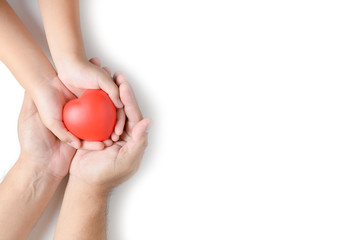 adult and child hands holding red heart isolated