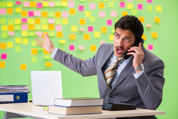 Businessman with many conflicting priorities   