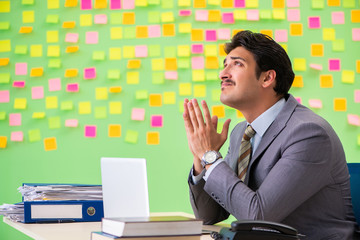 Businessman with many conflicting priorities   