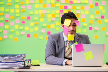 Businessman with many conflicting priorities   