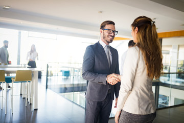 Picture of business colleagues talking in office