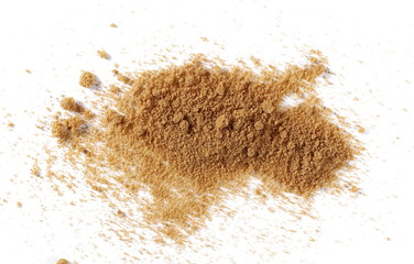Unrefined brown cane sugar pile isolated on white background, top view