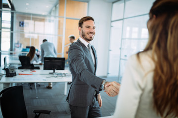 Picture of business colleagues talking in office