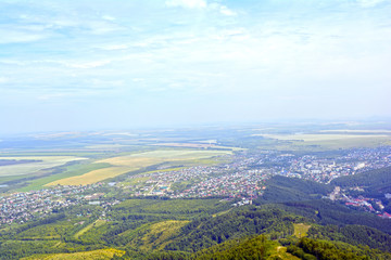 a provincial town. Forest, mountains. Bird's-eye