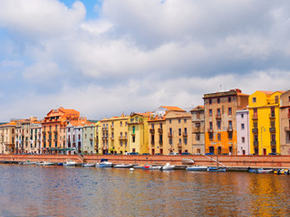 River embankment in the city of Bosa with colorful, typical Italian houses. province of Oristano,...