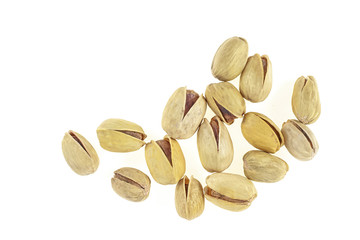 Pistachios isolated on white background, top view.