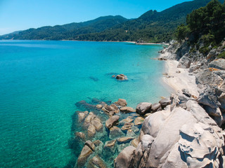 Sunny sandy beach with clear water