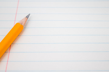 Back to school, education concept with orange pencils close up and composition book on background for educational new academic year begin or study term start. Mock-up Copy space