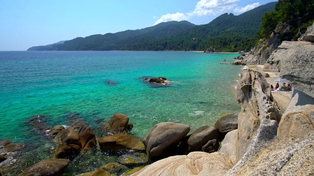 Sunny sandy beach with clear water