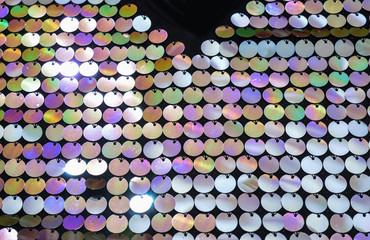 Texture of color pearlescent sequins, macro photo