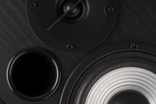 Multimedia speaker system with different speakers closeup over black background