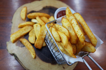 French fries on wooden table