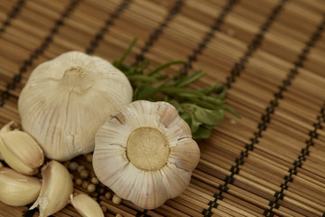 Close purple garlic and pepper