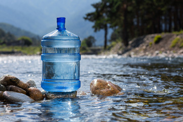 Natural drinking water in a large bottle - 217655043