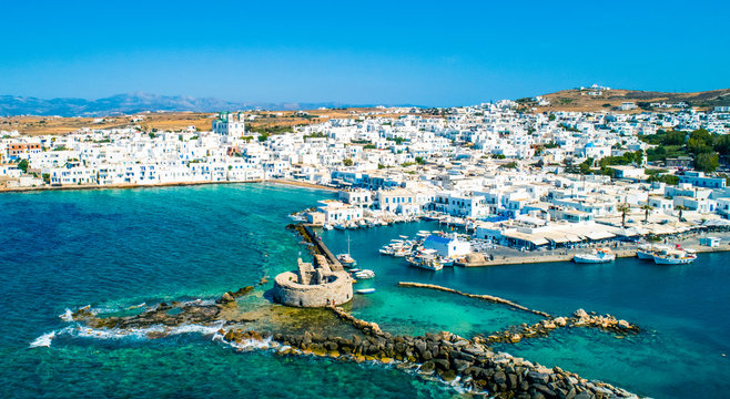 Ancient ruins of Venetian castle in the harbor of Naoussa town, view from above, Paros island, Greece