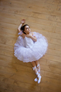 Little girl ballerina in a white tutu