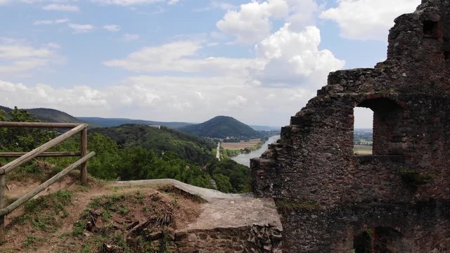 Stone walls of the ancient Donaustauf Castle, panoramic scene. Aerial view of Danube river and Walhalla memorial on the hill, Donaustauf, Bavaria, Germany