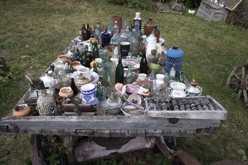 Open air museum of old unnecessary things, antique unwanted junk on the table