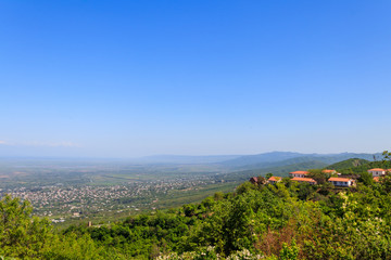 Fototapeta na wymiar View on Alazani valley and Caucasus mountains from Sighnaghi, Kakheti, Georgia