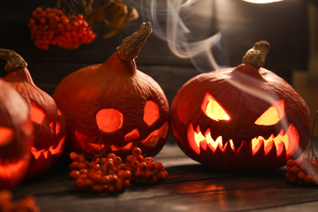 halloween pumpkin lanterns with luminous scary faces