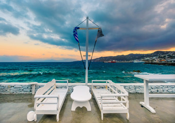 Table in cafe outside near the sea in Mykonos, Greece