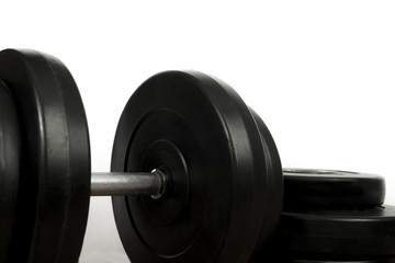 Dumbbell and plates isolated on white background