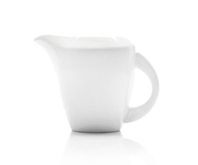 ceramic white milk jug isolated on a white background