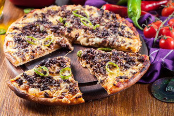 Spicy pizza with minced meat and jalopeno