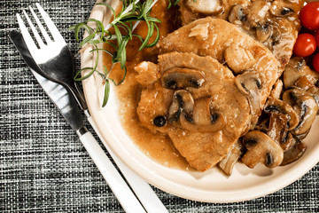 Braised pork chop with mushrooms.