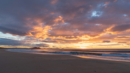 Colourful sunrise over the beach