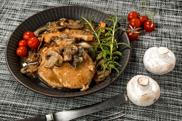 Braised pork chop with mushrooms.