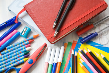 Fototapeta premium school supplies on a white table