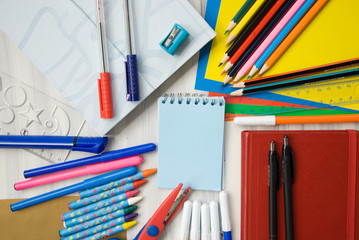 school supplies on a white table