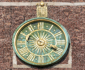 Fototapeta na wymiar Close-up photo of the clock at the Wawel Cathedral. Krakow, Poland.