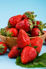 juicy fresh strawberry on a delicately blue background