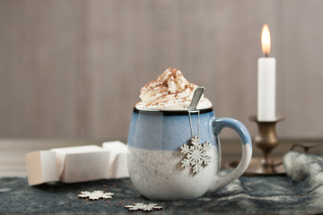 Mug Of Hot Chocolate. Burning Candle. Christmas Decorations.