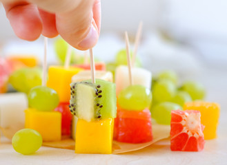 Canapé from pieces of tropical fruits